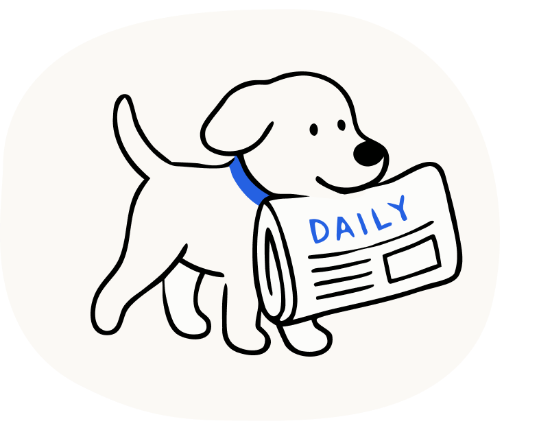 新聞をくわえた犬